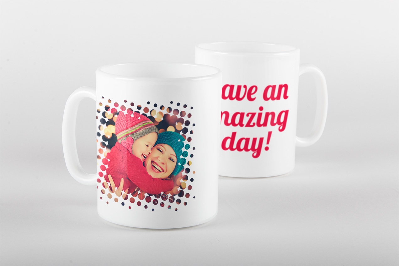 Two white photo mugs, one with a halftone dot photo frame of two children, the other reading 'Have an amazing day!'