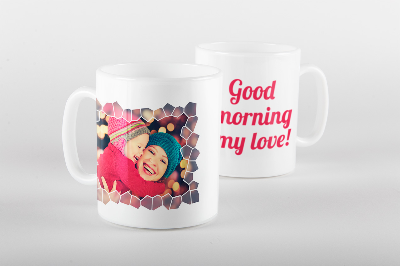 Two white photo mugs, one with a faceted crystal photo frame of two children, the other reading 'Good morning my love!'