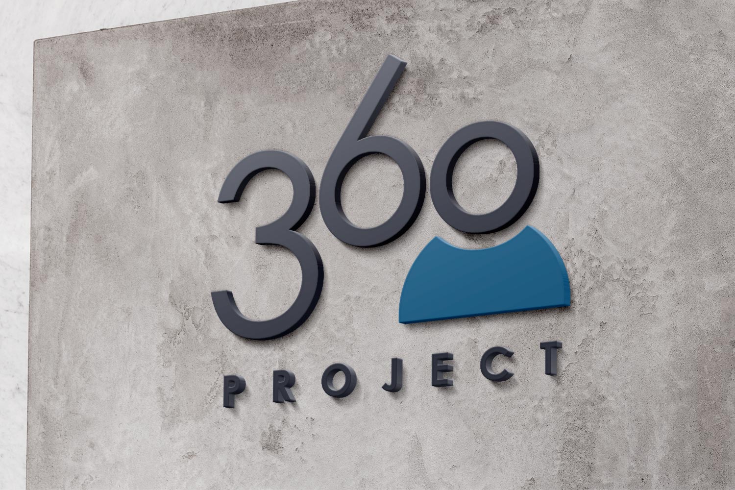 360 Project logo mounted on a concrete wall: '360' with a person icon forming the zero