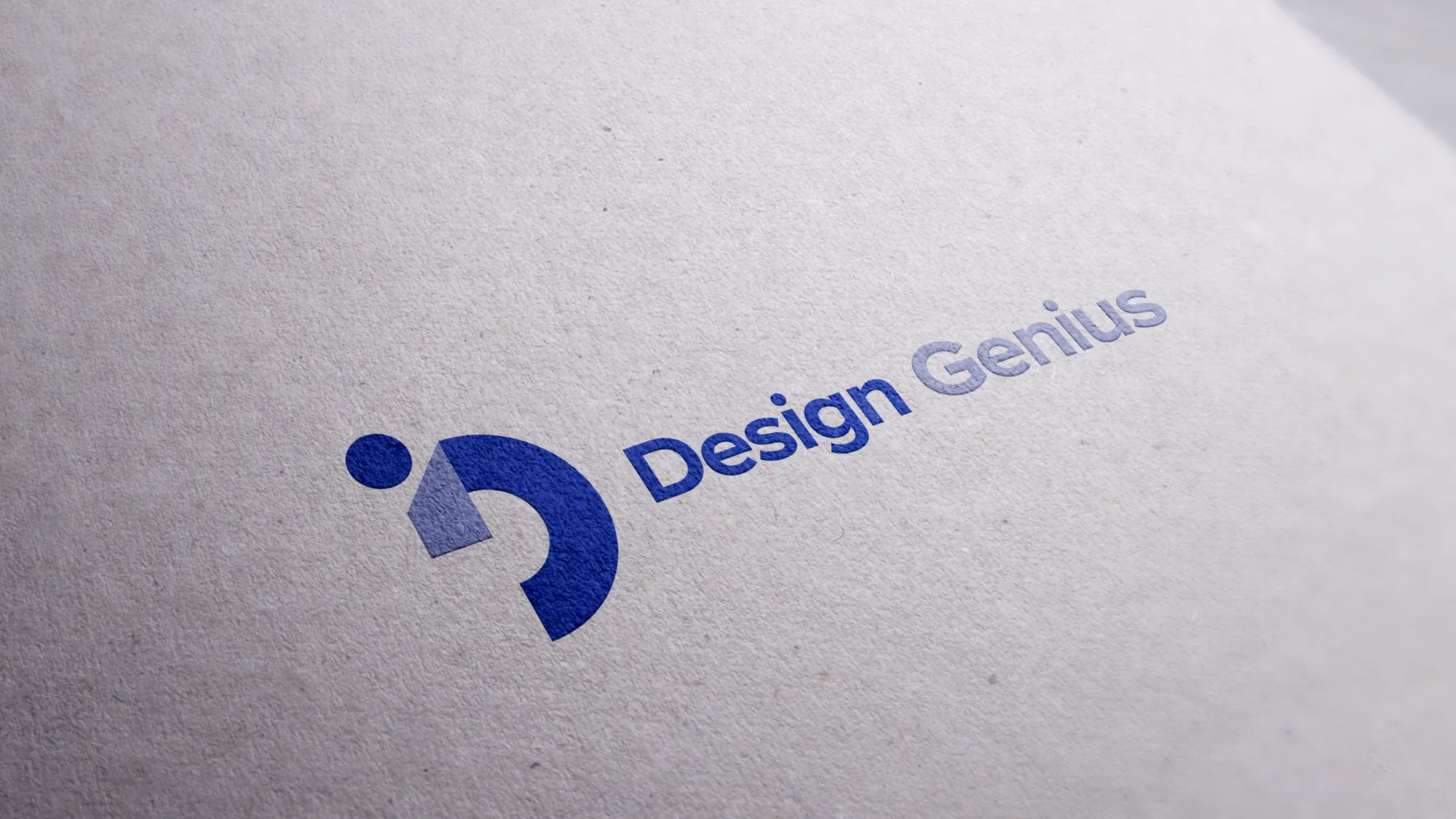 Design Genius logo embossed on textured paper