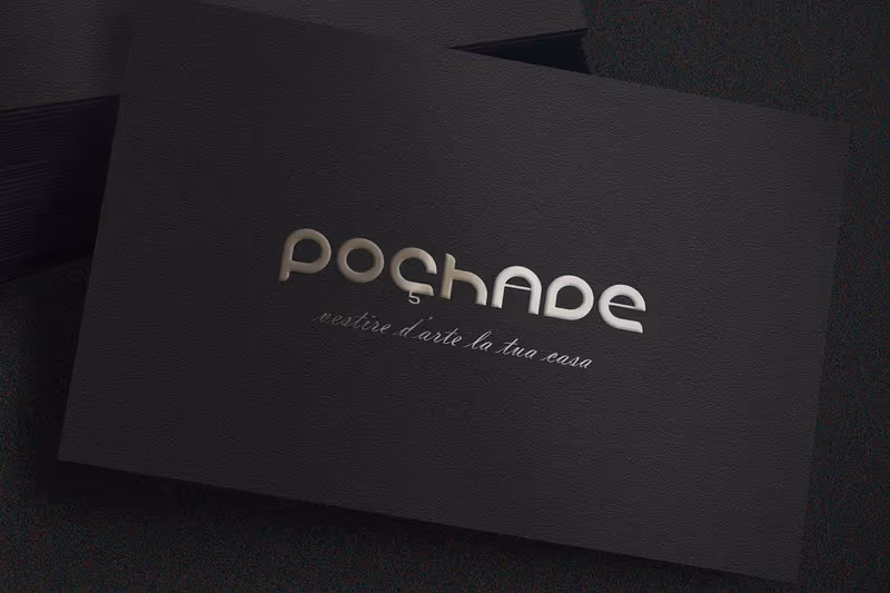 Pochade logo in silver ink on a black business card