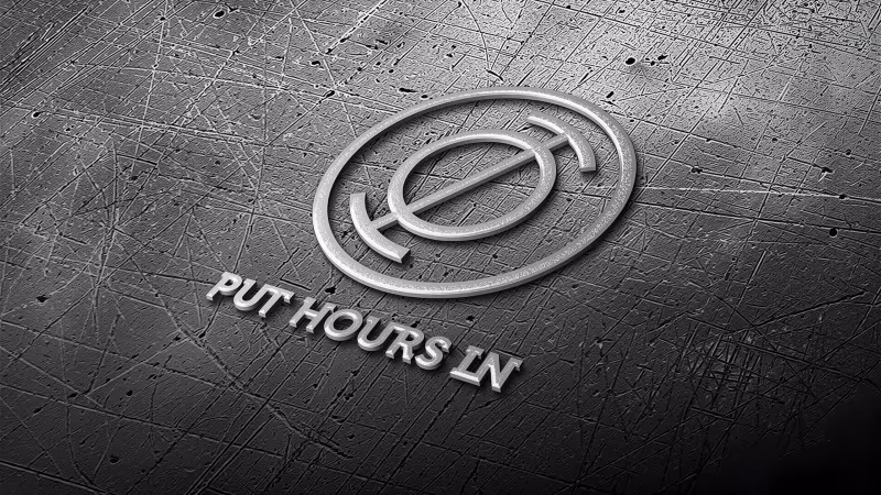 Put Hours In recording studio logo: a circular monogram forming the Greek letter phi, styled like a spinning record, in raised metal on a scratched, dark surface
