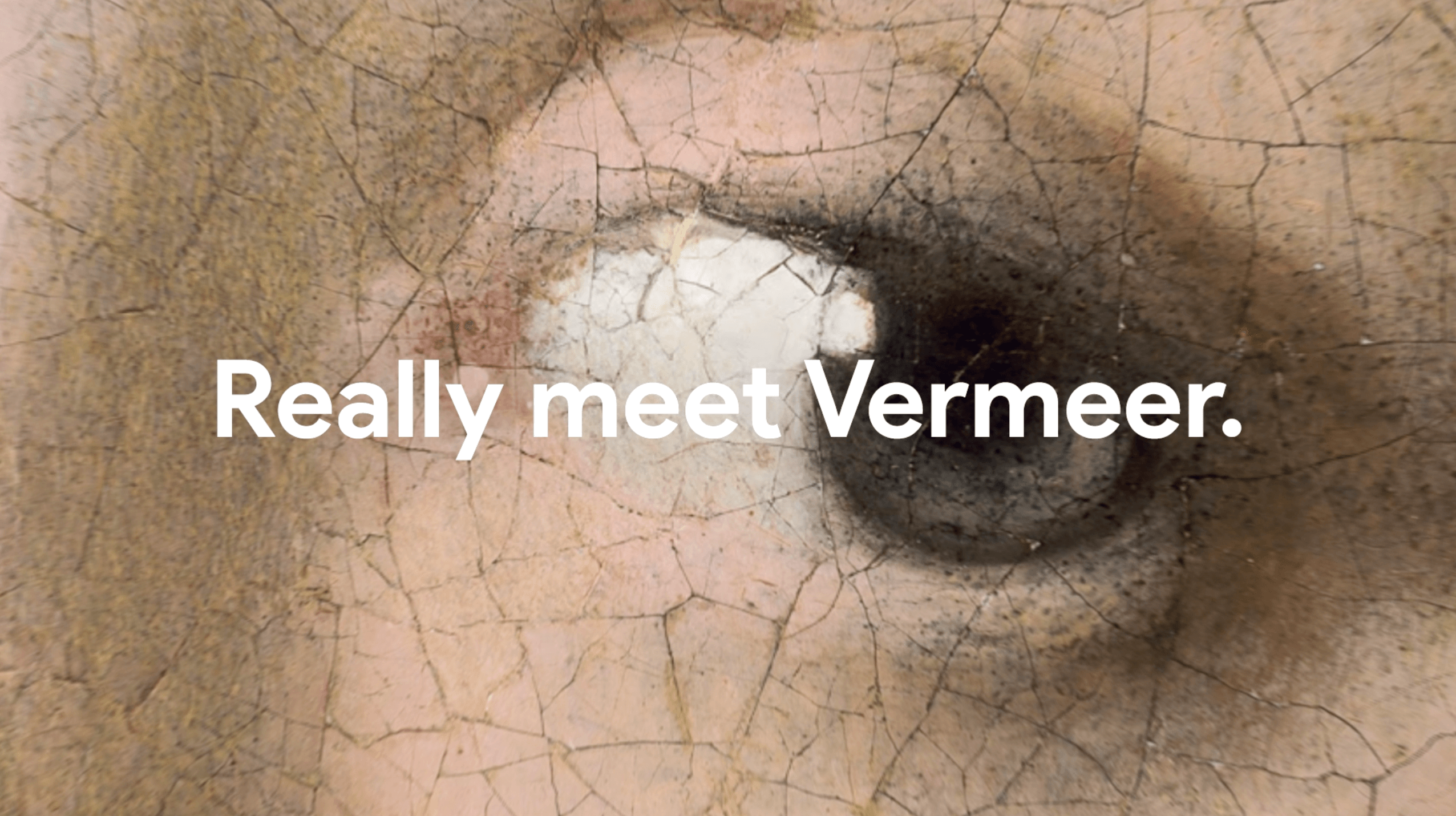 Close-up of a painted eye from a cracked and aged Vermeer artwork with the text 'Really meet Vermeer' overlaid.