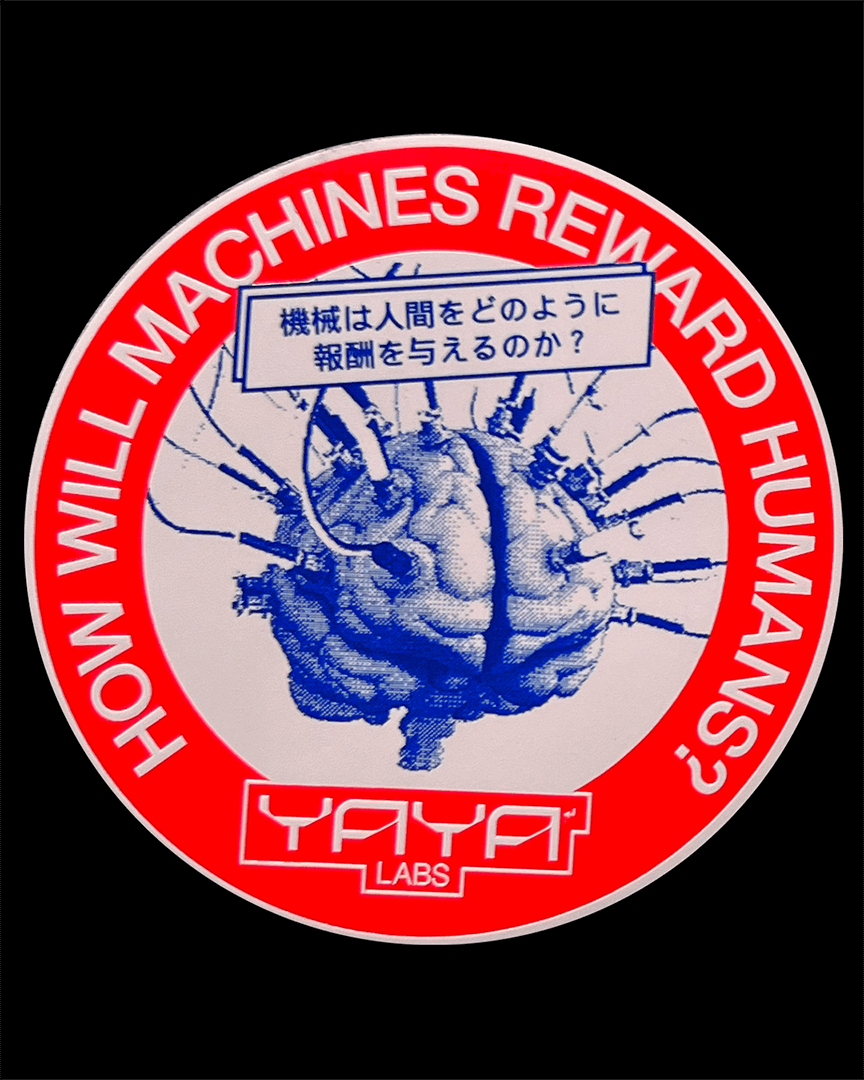 Circular badge with a blue illustration of a brain connected to multiple machine wires, surrounded by a red border with white text reading 'HOW WILL MACHINES REWARD HUMANS?' and the label 'YAYA LABS' at the bottom; a Japanese text box appears above the brain.