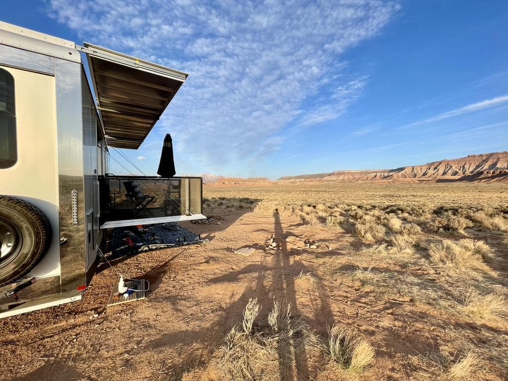 living vehicle rv with the awning up
