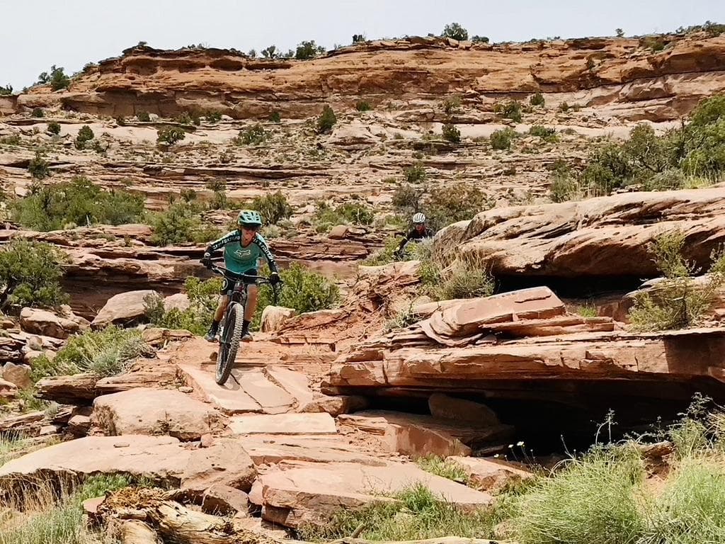 Man riding a bike off grid