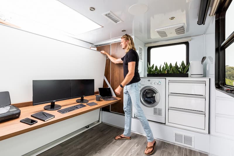 look at washer and dryer inside a luxury rv