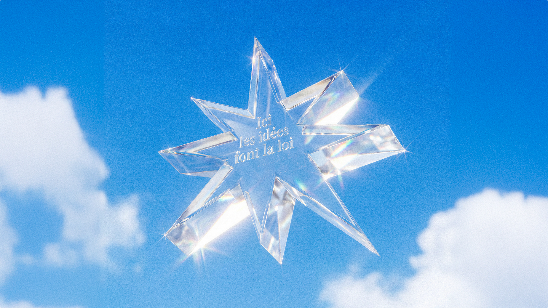 Étoile de verre we are bandits flottant dans un ciel bleu