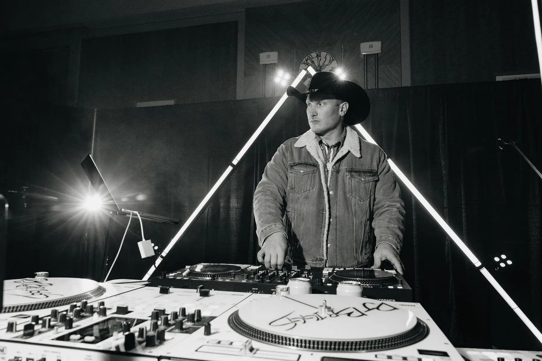 Jordan Waldo performing behind an RMF DJ booth