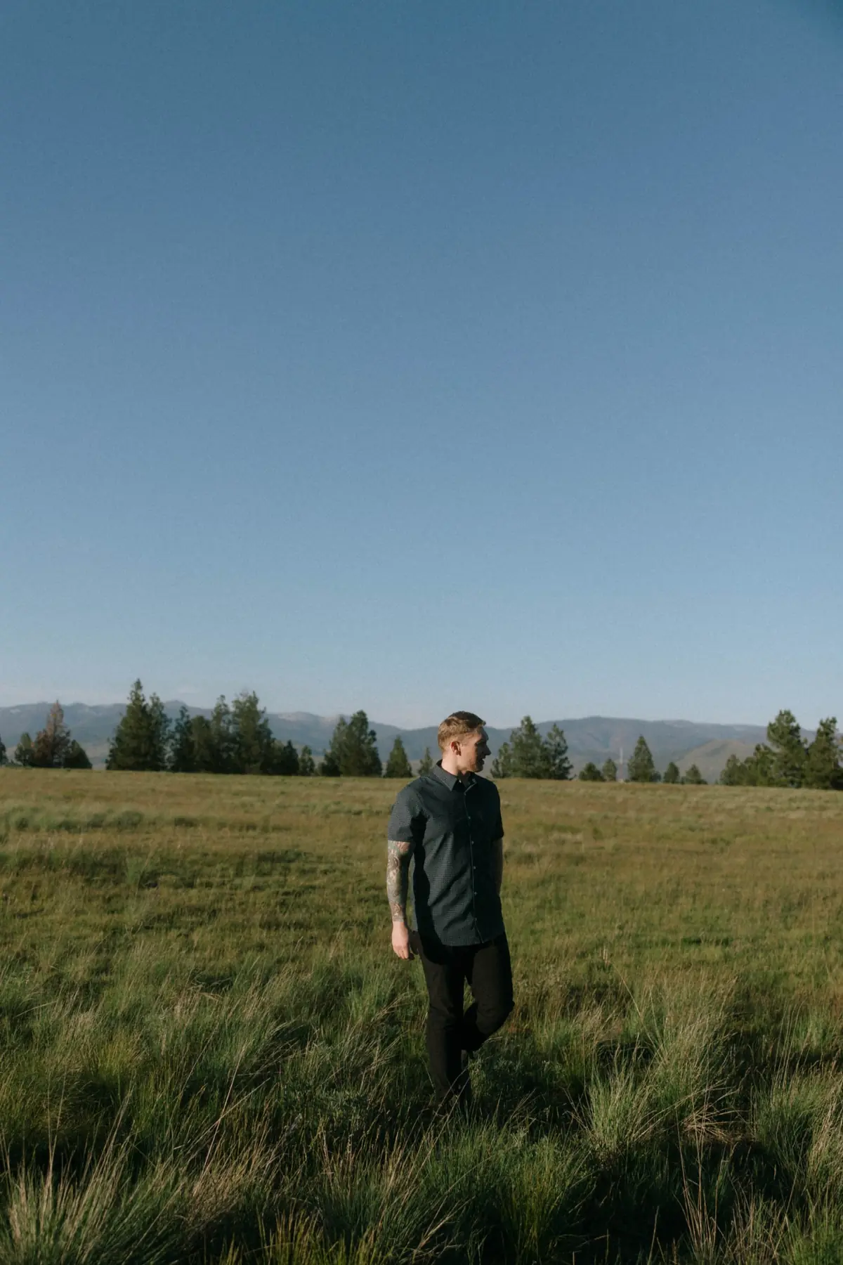 Jordan Waldo, RMF Entertainment owner and open-format wedding DJ, outdoors in Montana