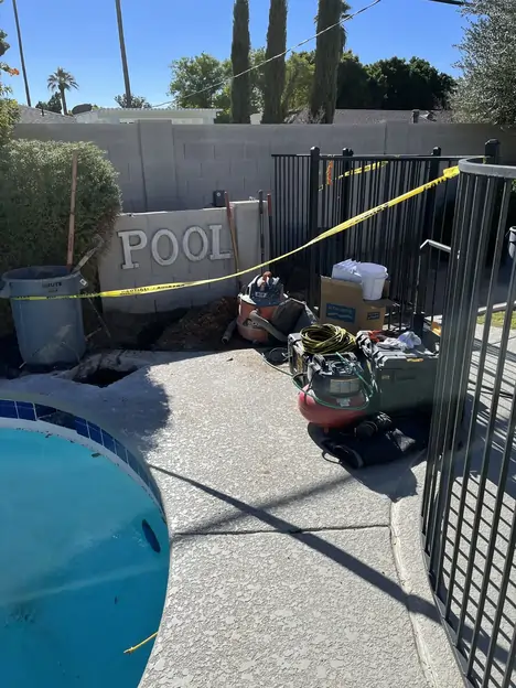 Leak Tech LLC technician pressure testing pool plumbing during leak detection in Mesa, AZ