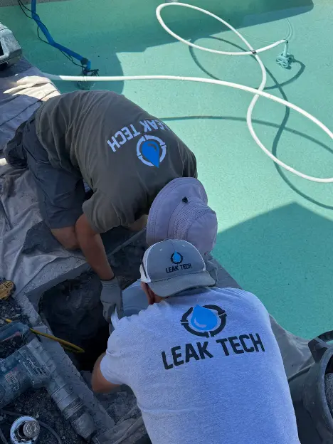 Leak Tech LLC technicians repairing an underground pool pipe in Scottsdale AZ
