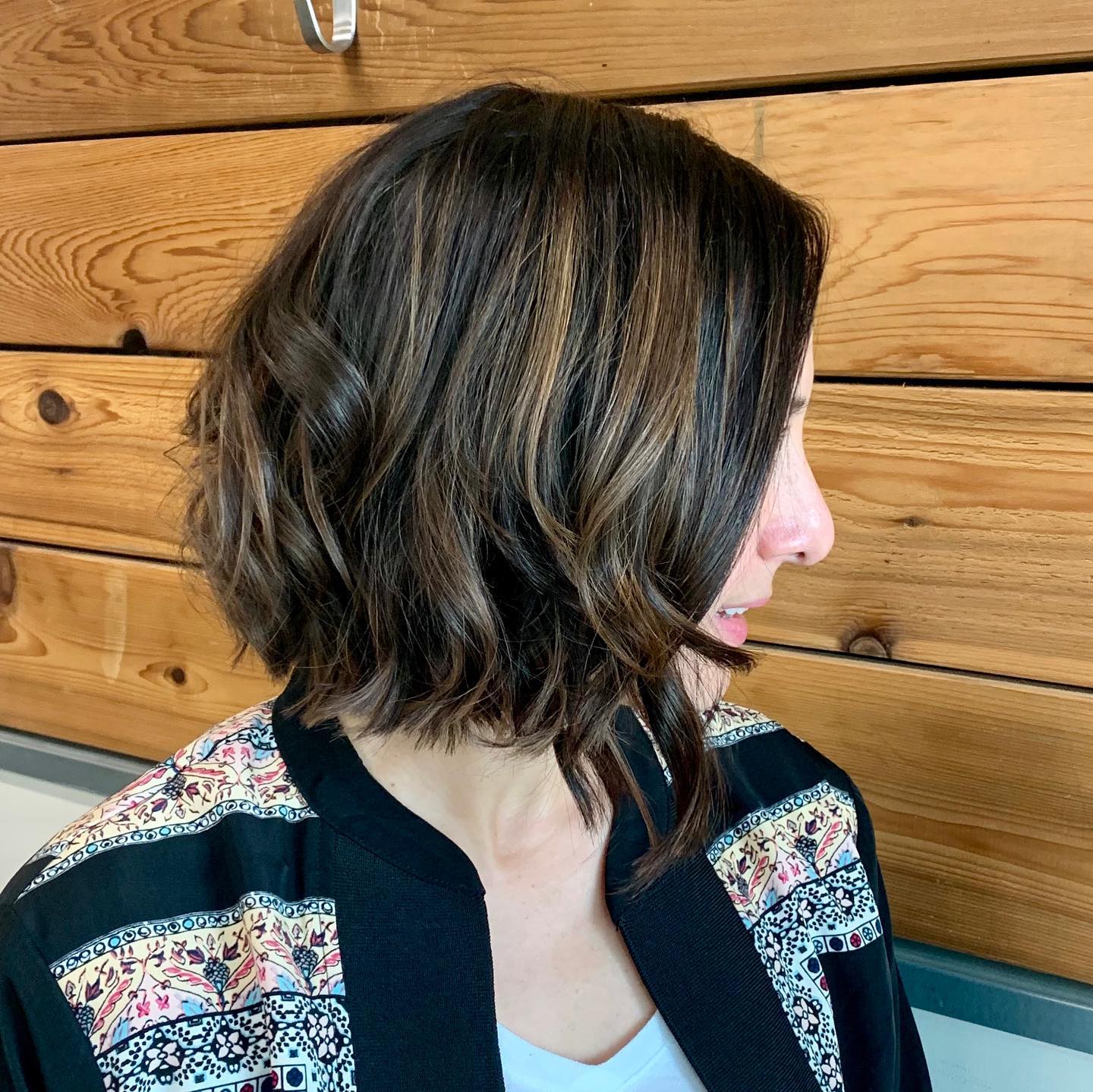 woman's haircut at hair salon