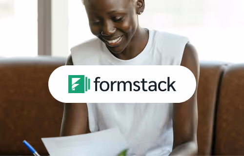 Smiling woman sitting on a couch holding papers, with the Formstack logo overlaid in the center.