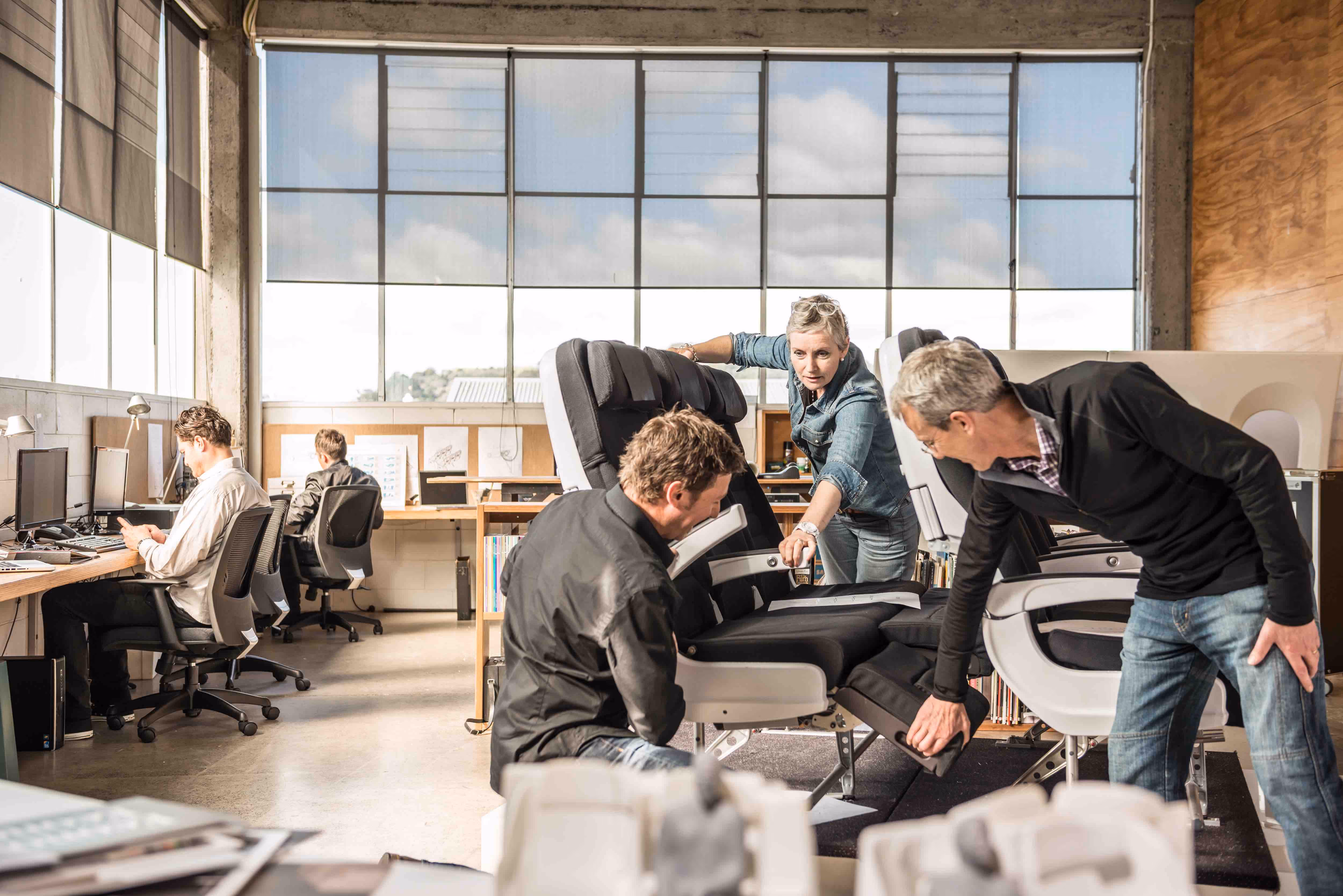 A group of people setting up an office