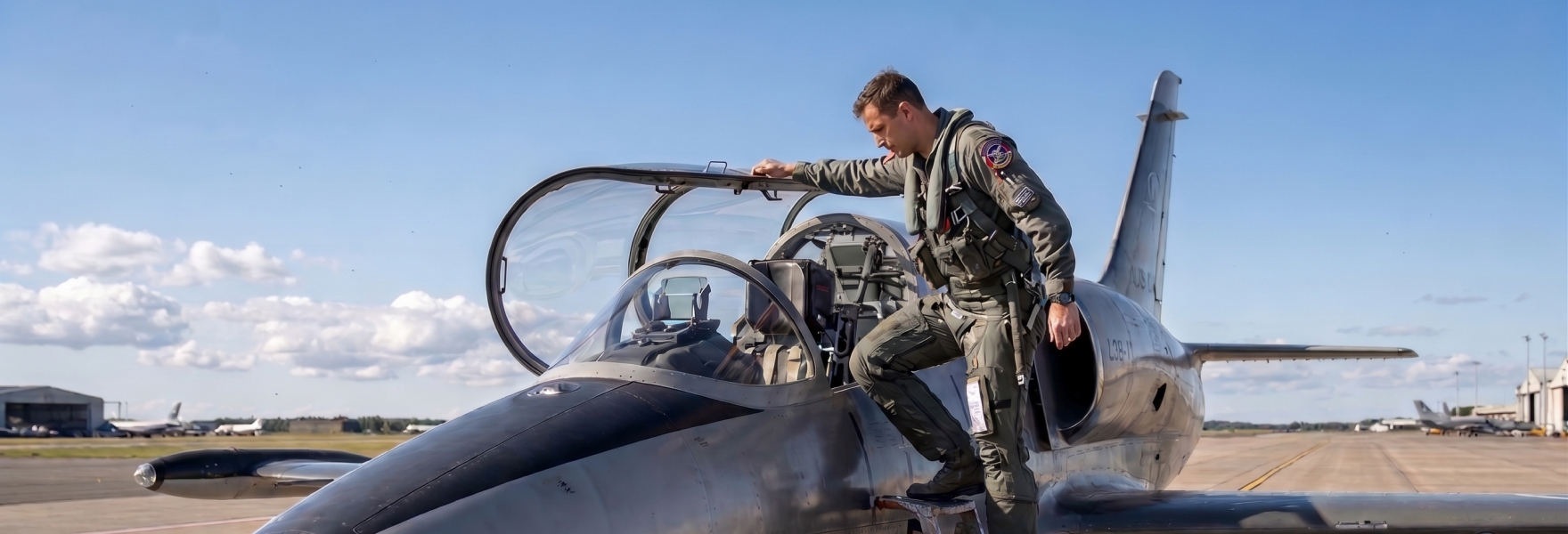 Pilot walking to a fighter jet on the airfield