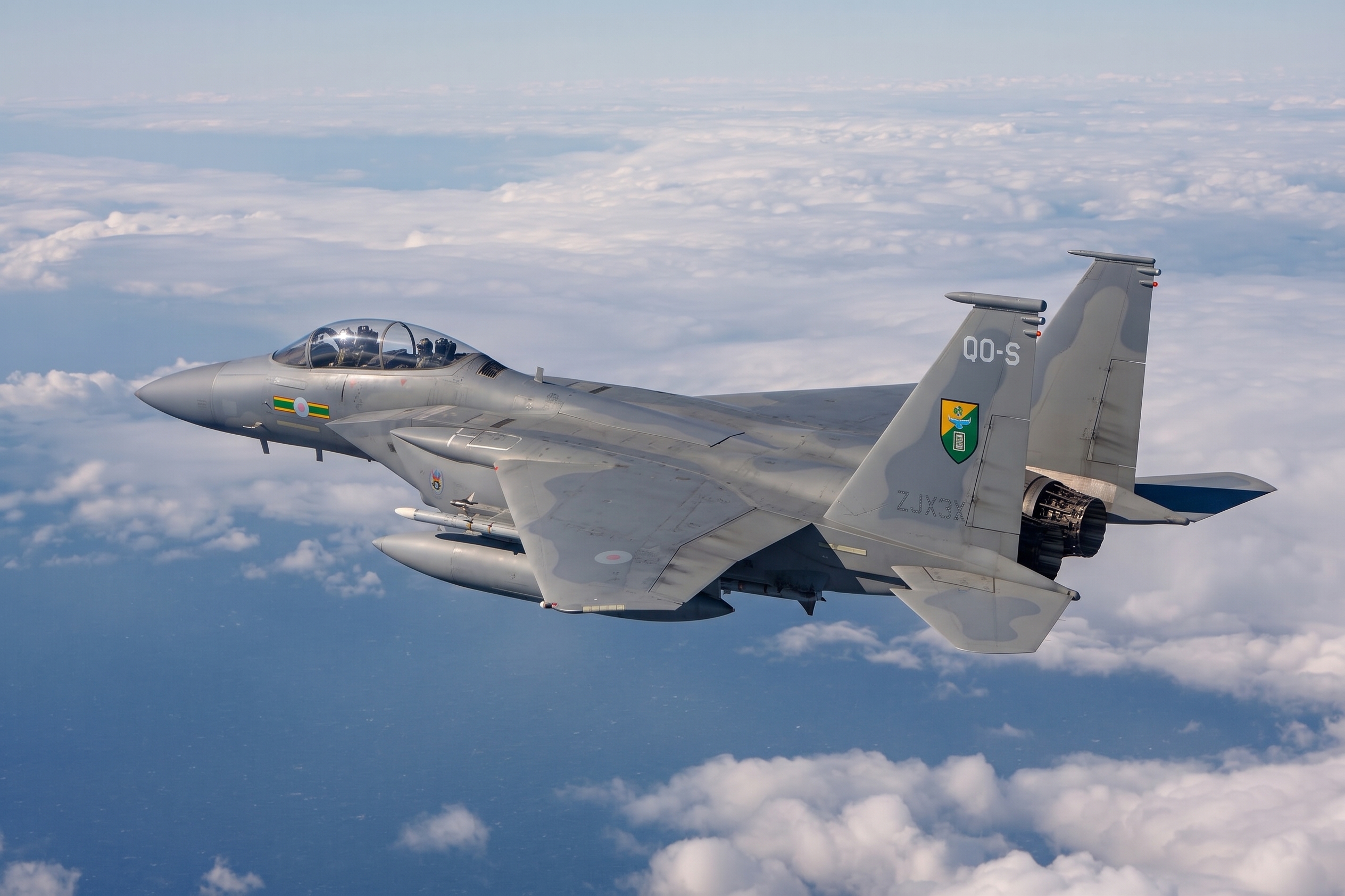 F-15 Eagle fighter jet banking in flight