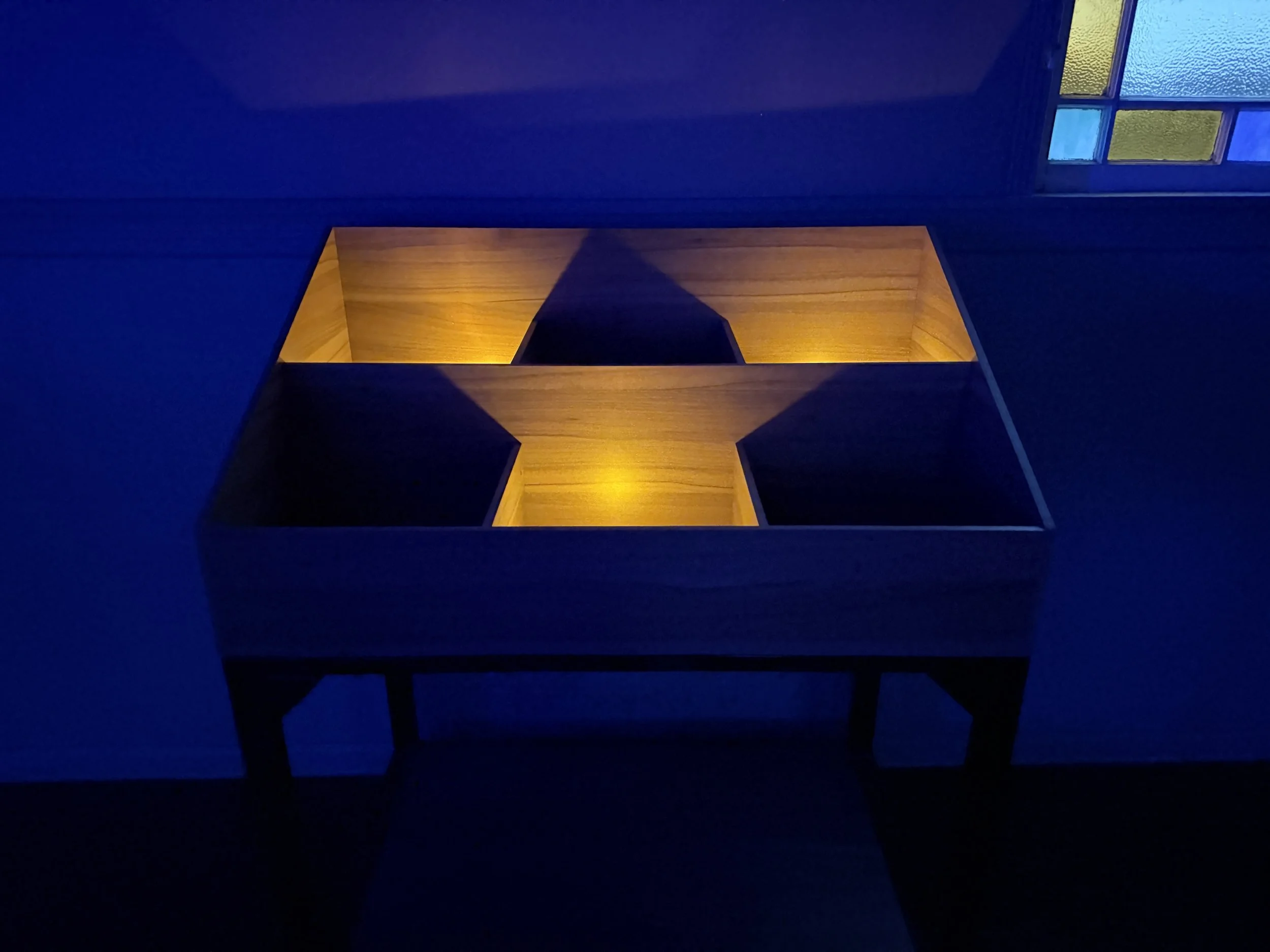 A star-shaped illuminated display on a table.