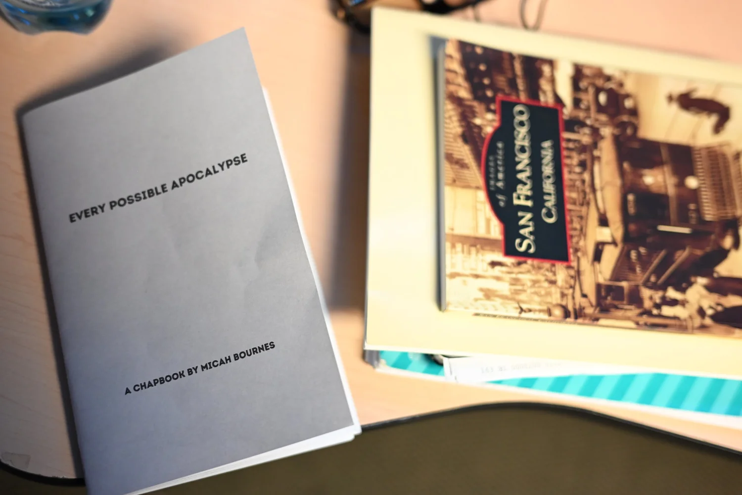 Poetry booklets displayed on a table.