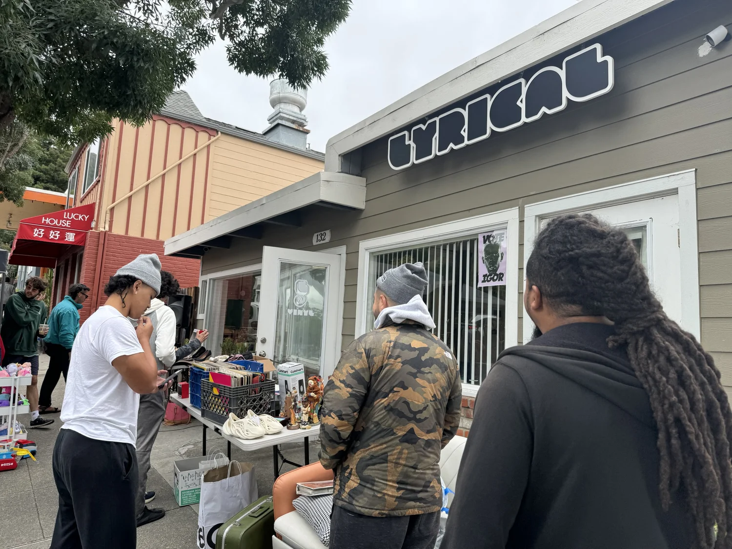 Visitors browse goods outside the LYRICAL storefront.