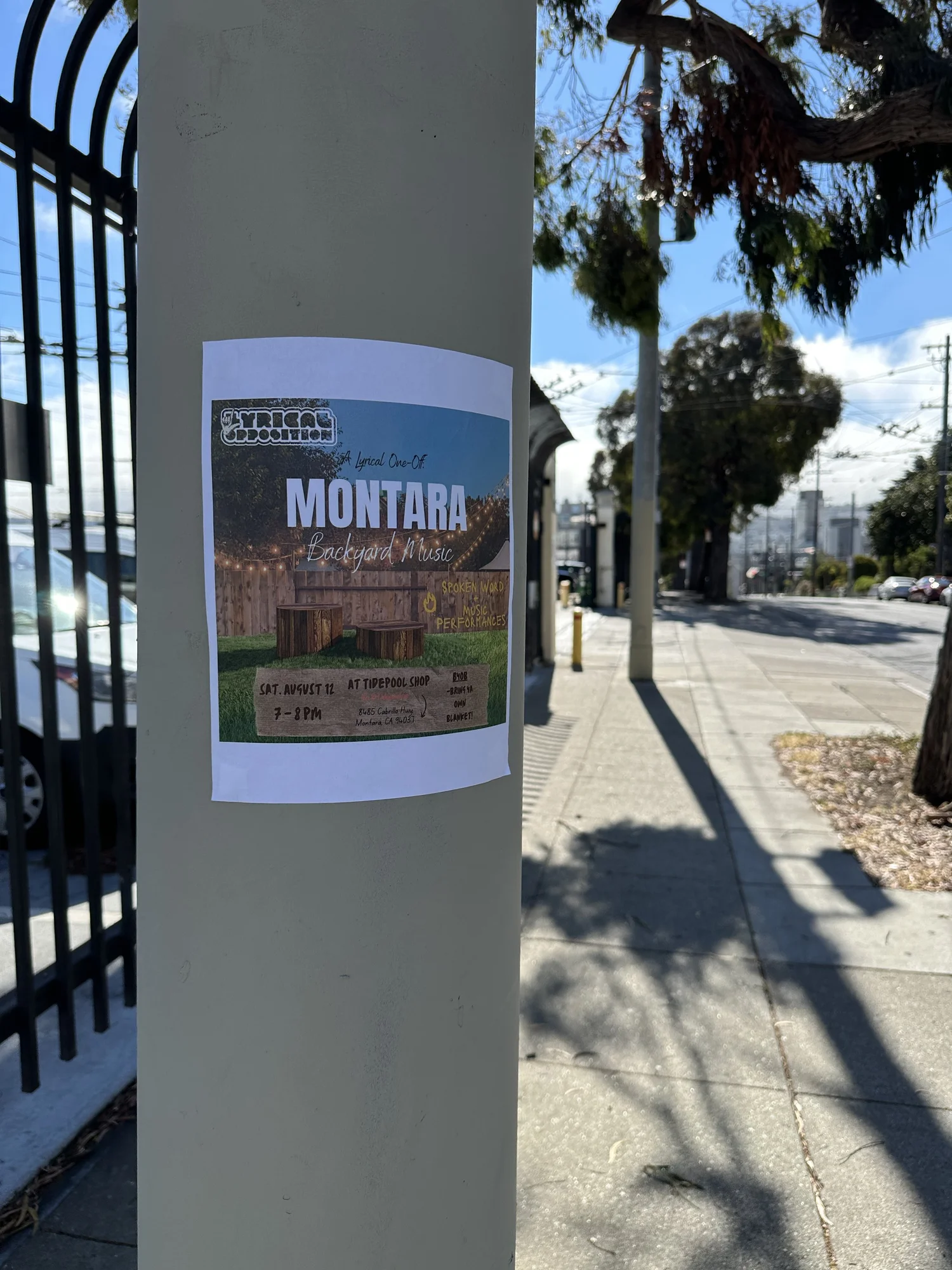 Montara Backyard Music poster displayed beside an entrance.