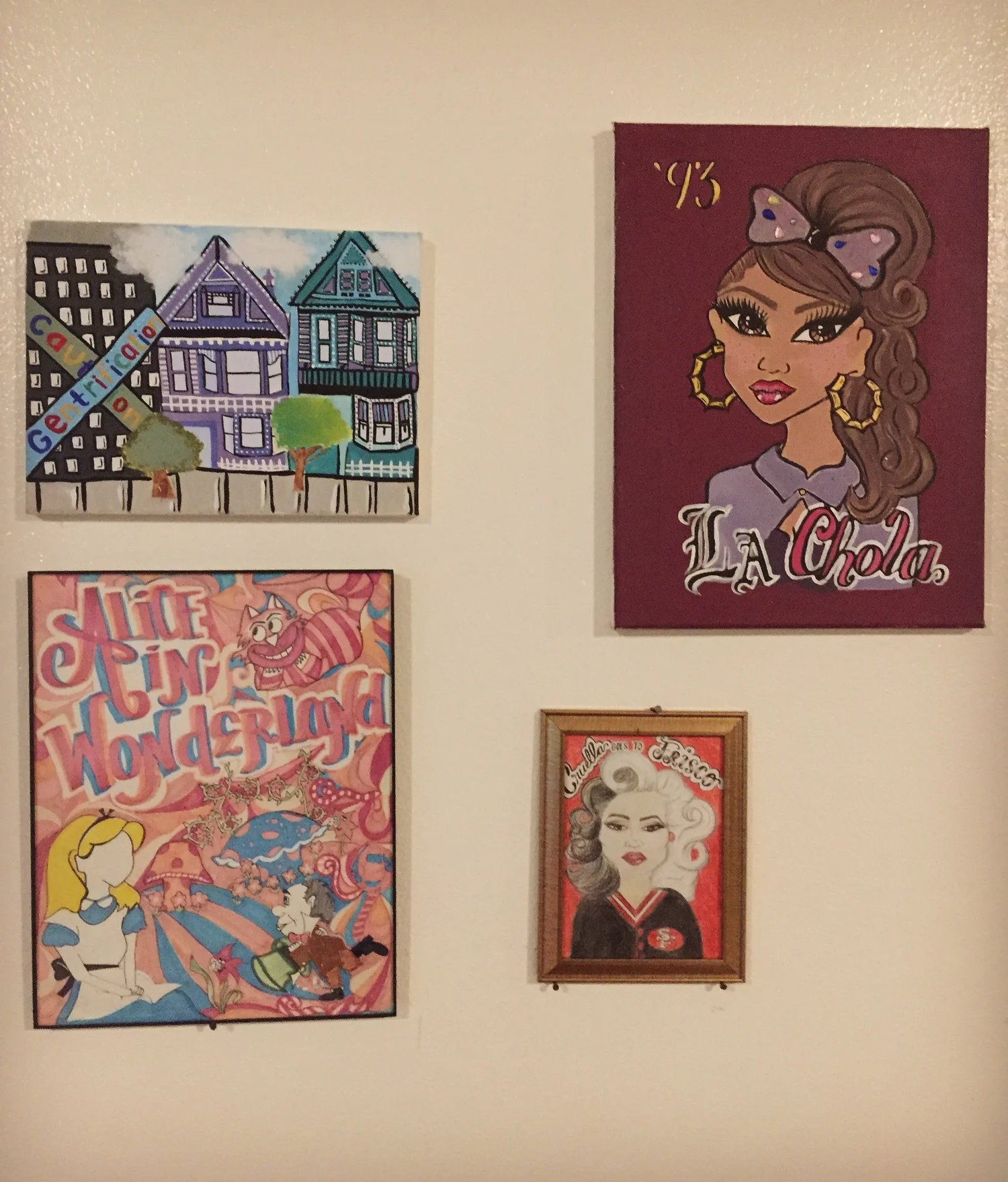 A collection of colorful illustrations displayed on a wall.