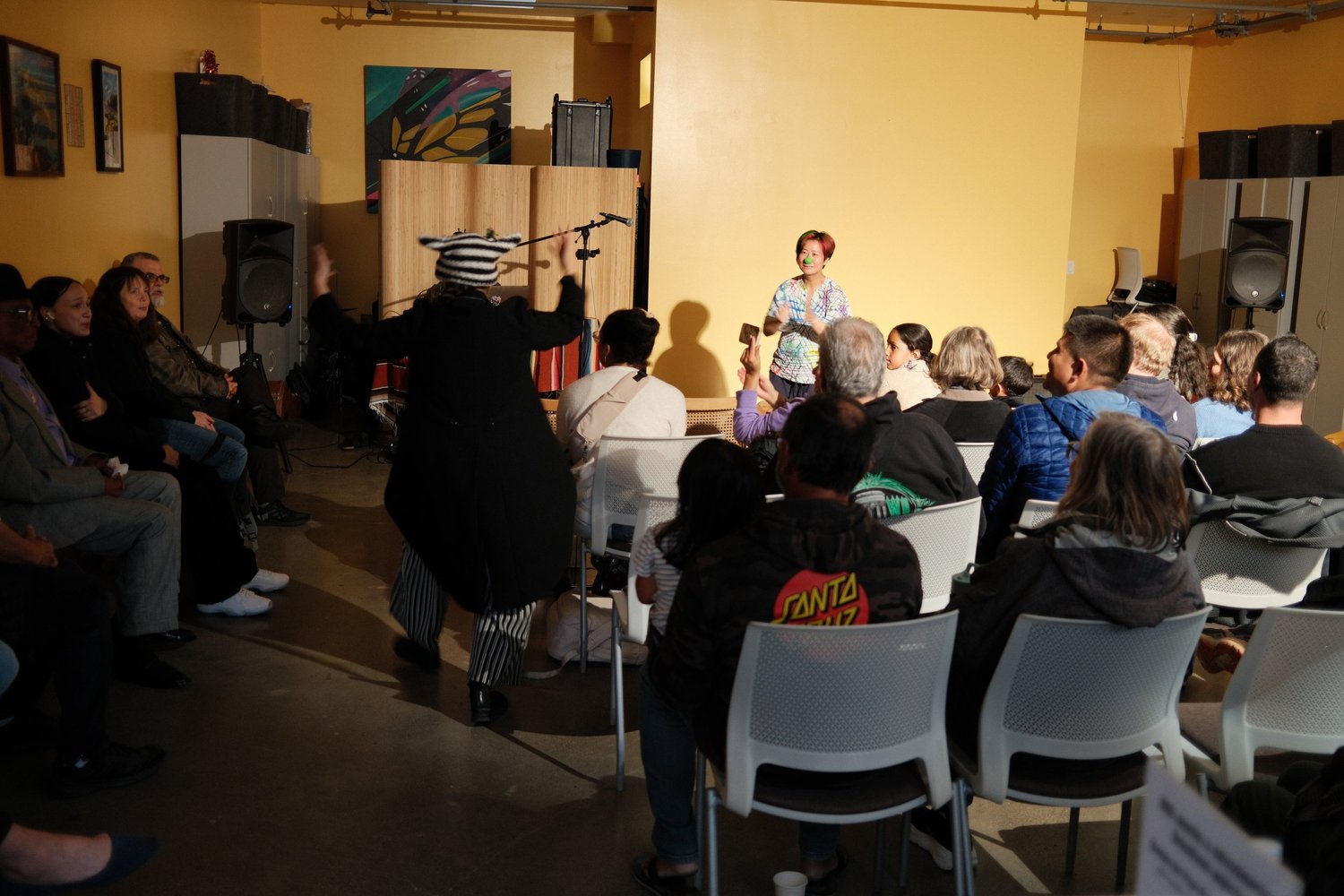 Wide view of a participant addressing the room.