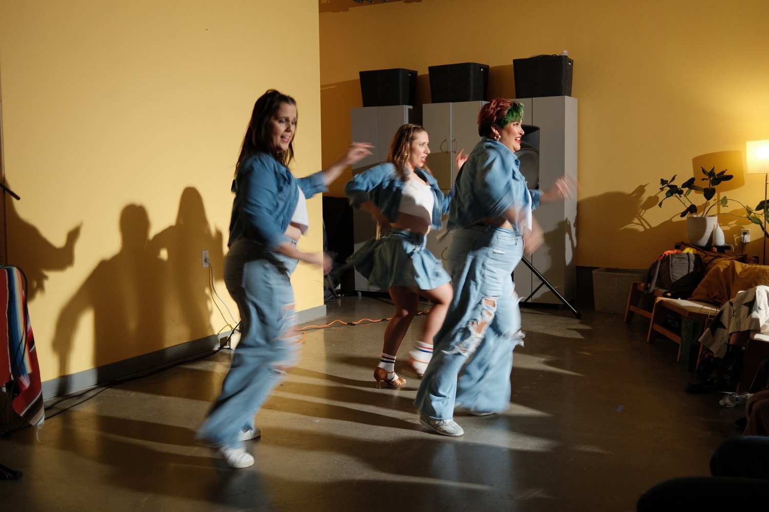 Dancers turning during their routine.
