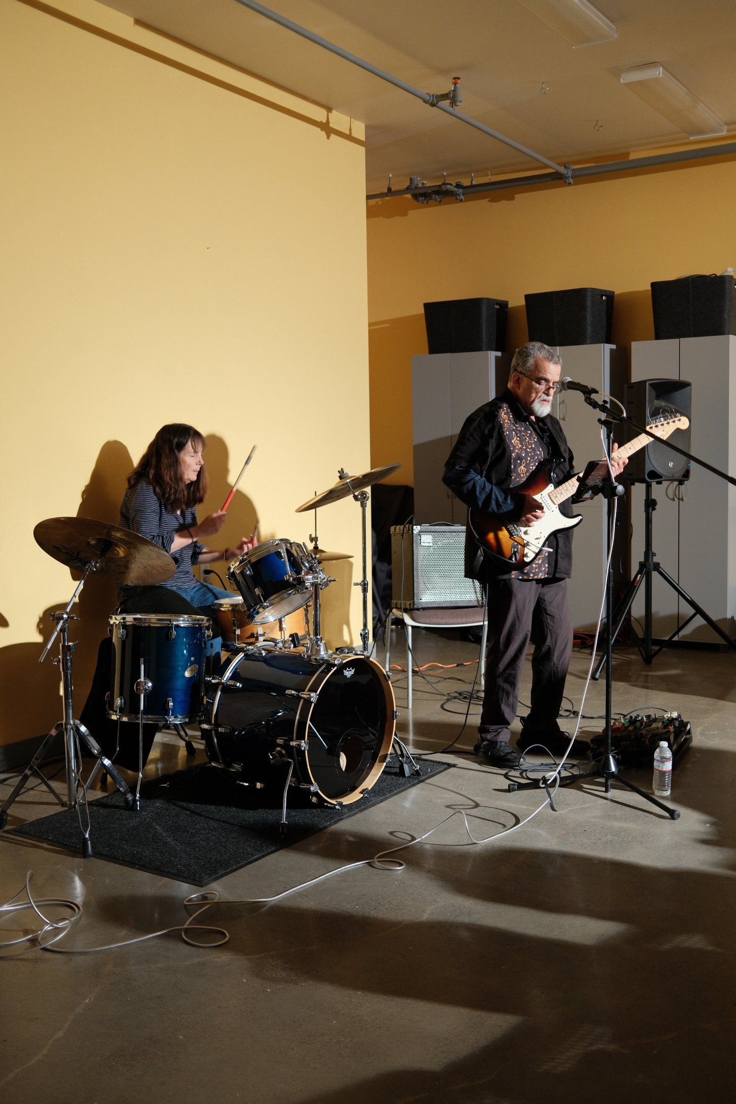 Vertical view of the two musicians performing.