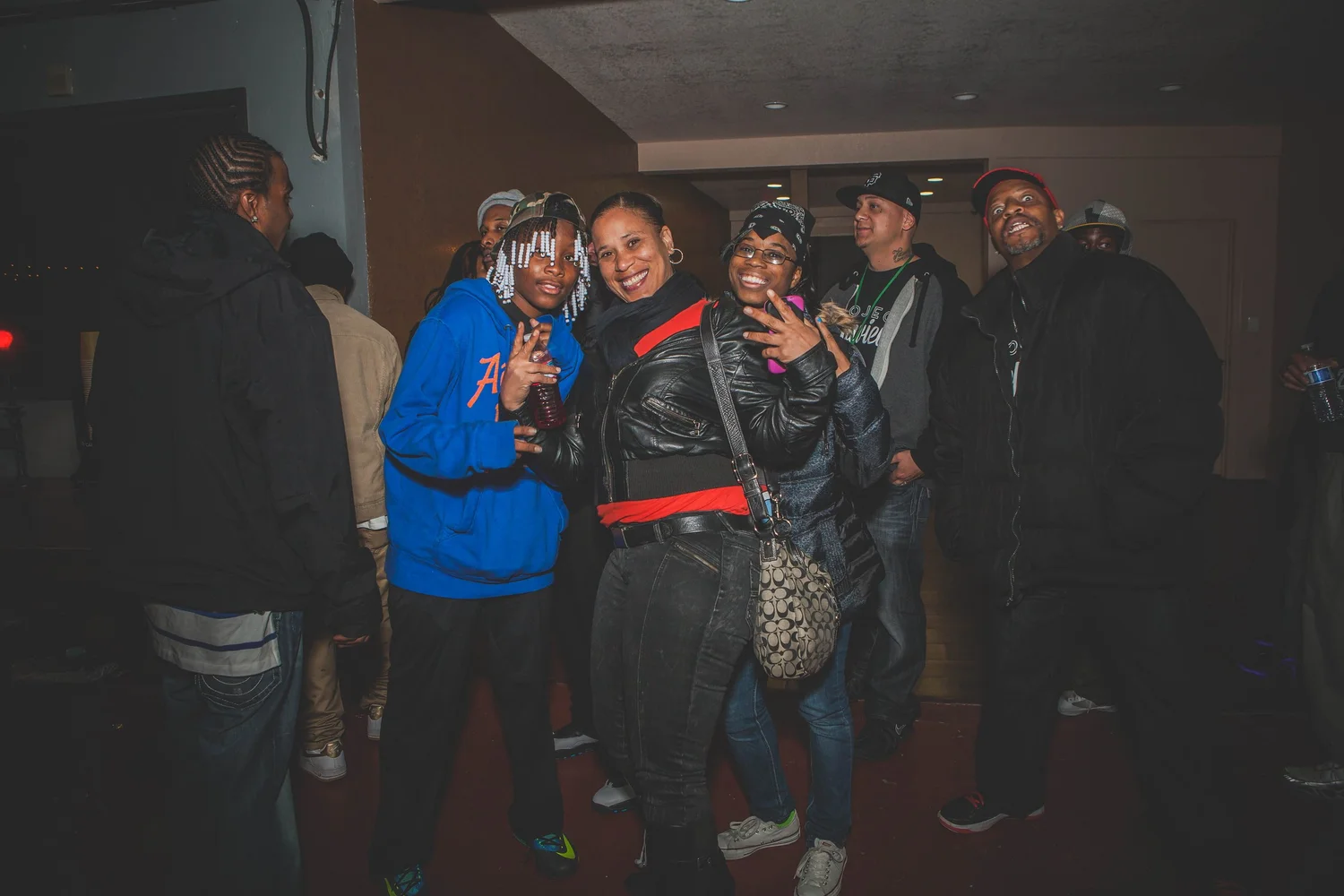 Group posing together in the venue.