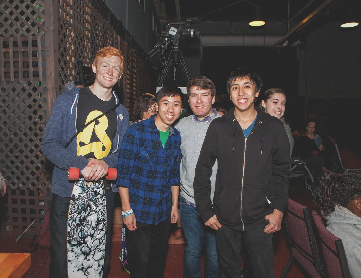 Group of young attendees posing together.