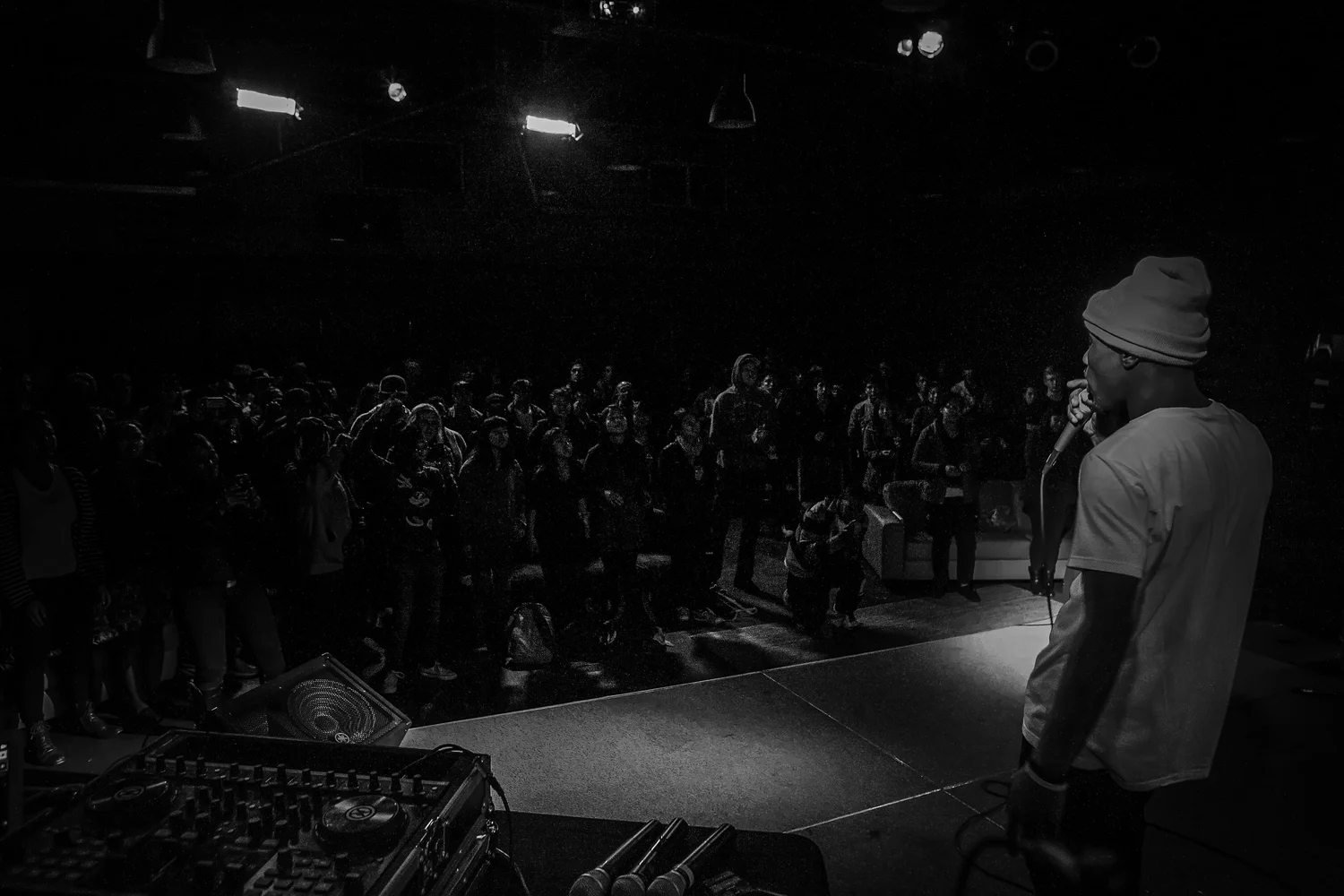 Black-and-white view from the stage toward the audience.
