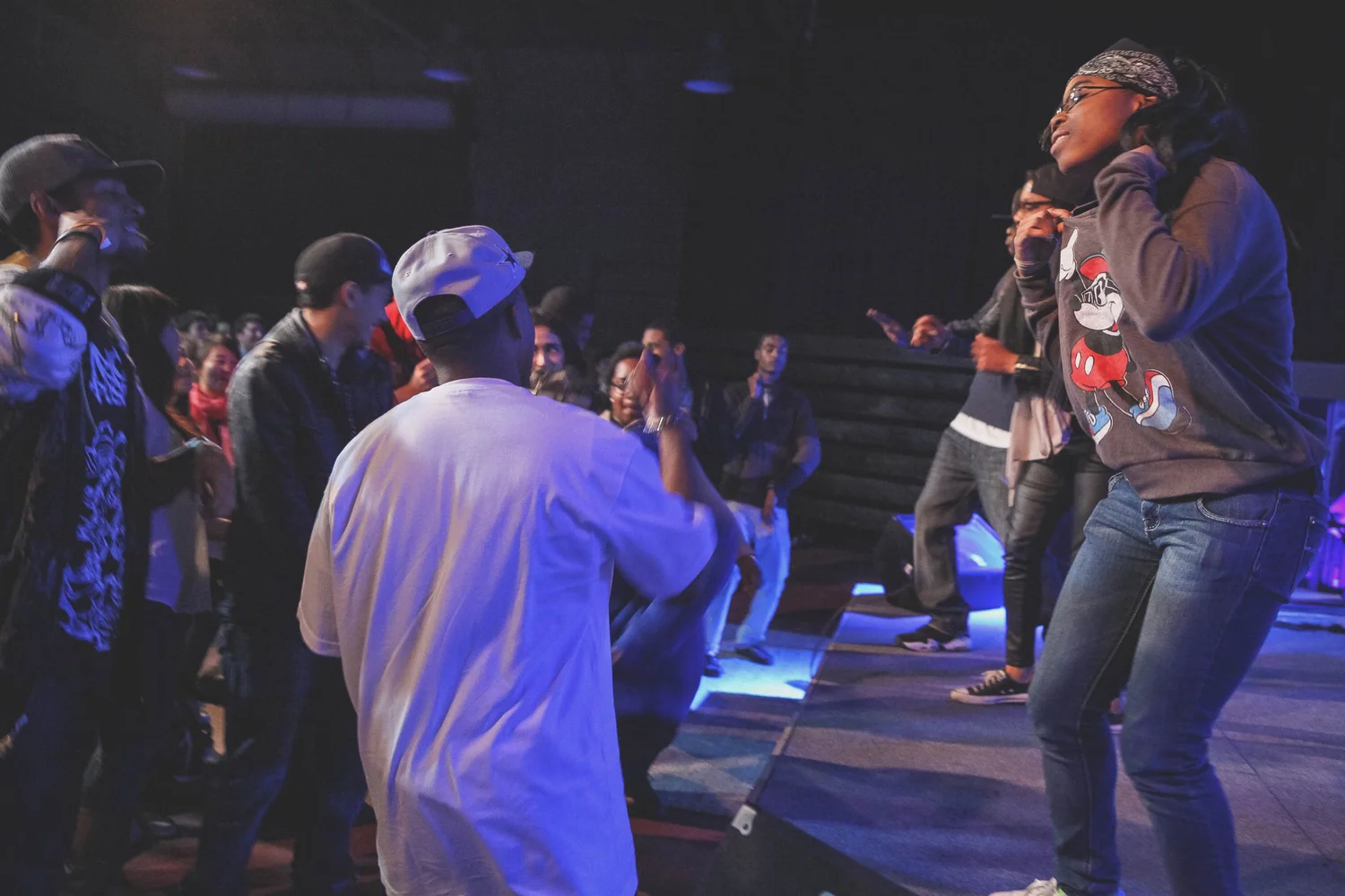 Vocalists gathered at the front of the stage.