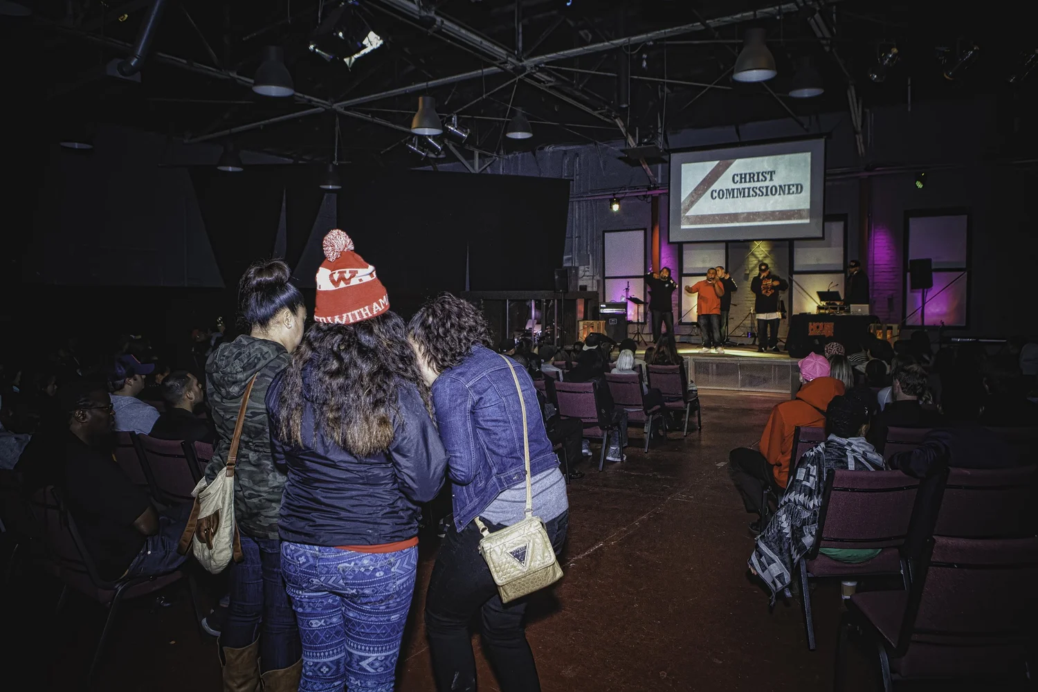 Attendees gathered near the back of the venue.