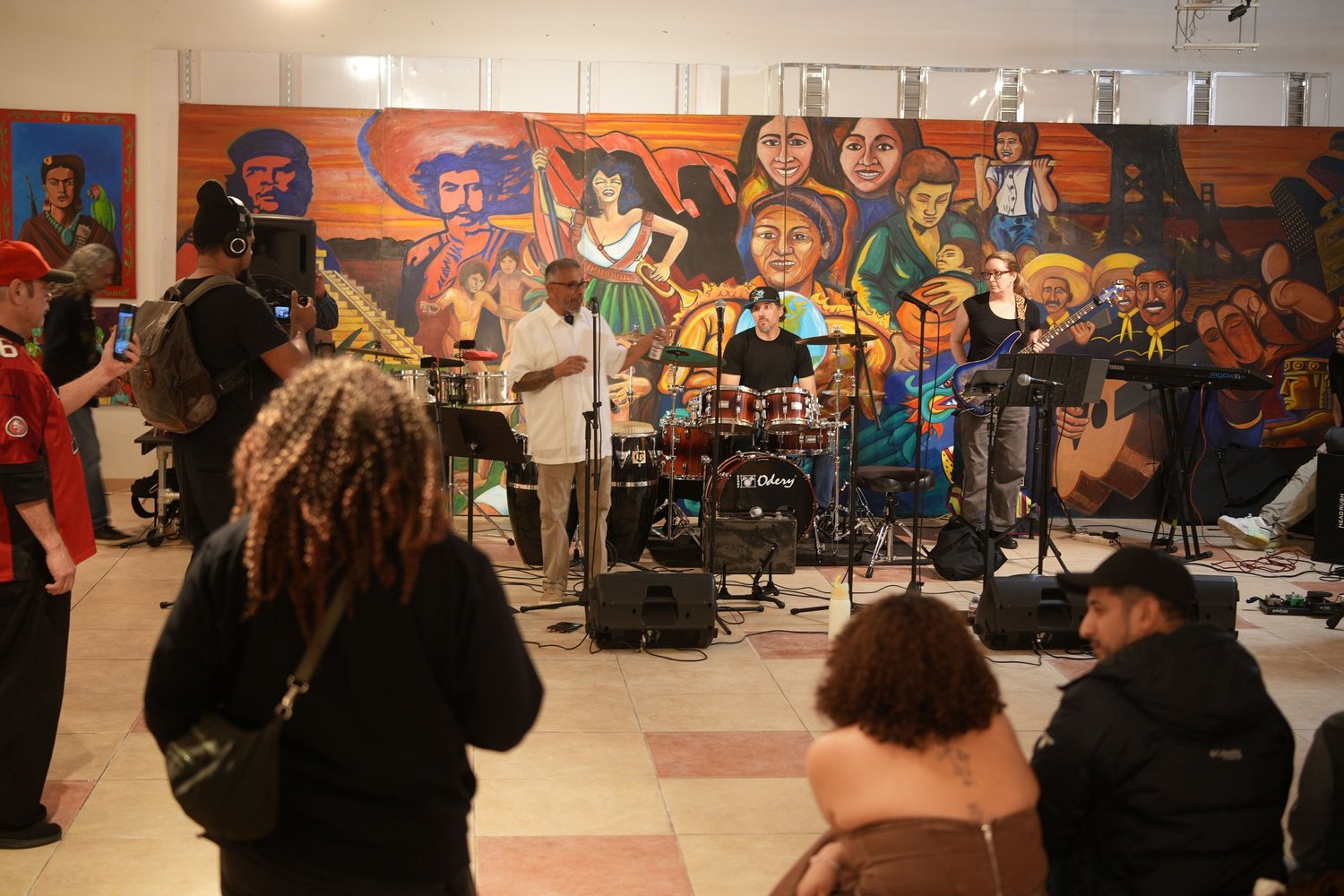 Guests watch the band perform.