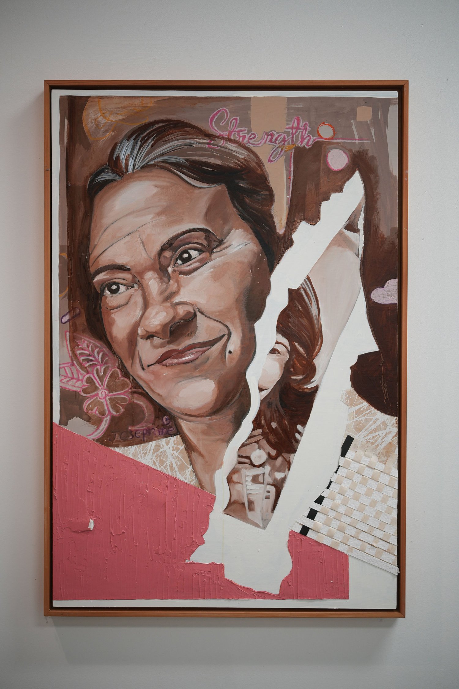 A framed portrait rendered in layered pink and brown tones.