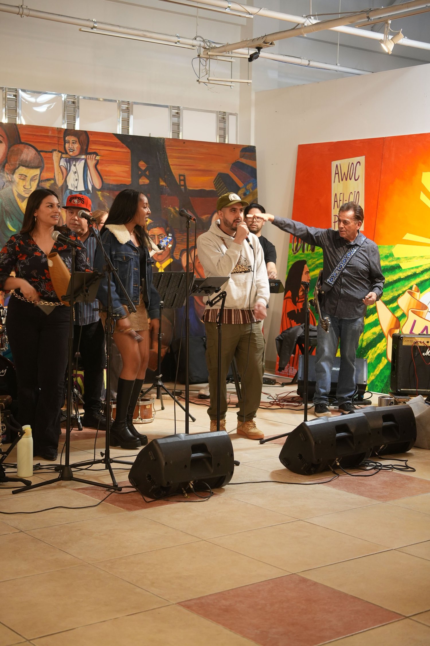 The band performs during the gallery gathering.