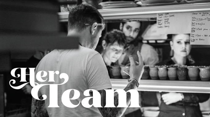 Her Team: bakers working together in the kitchen.