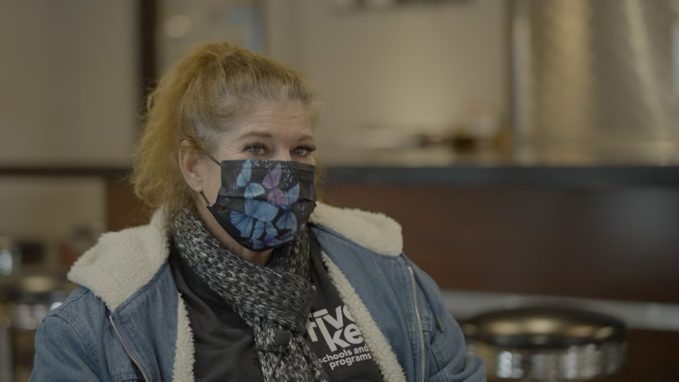 Interview subject wearing a patterned face mask.