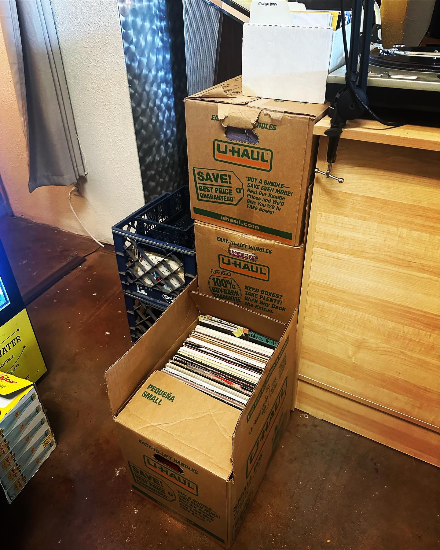 Boxes and crates of the first records from The Stacks Record Shop, July 2023.