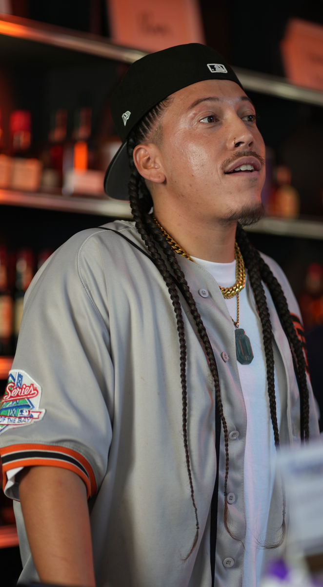 Oscar Xavier Cuadra as OG Store Owner