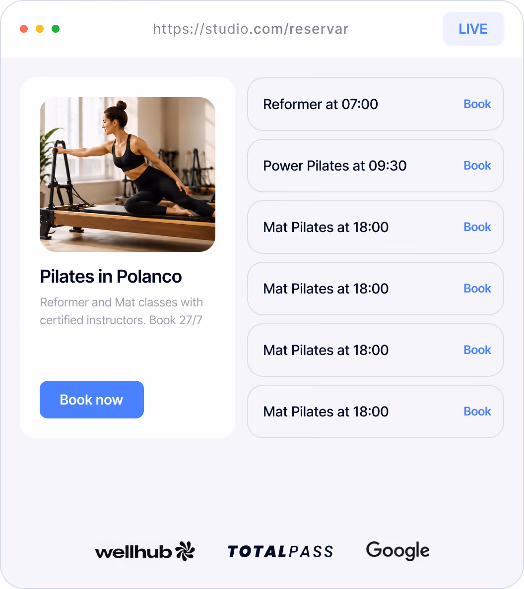 Woman in black athletic wear doing Pilates on reformer machine in a bright studio.