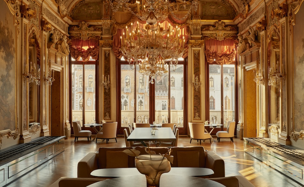 Luxury boutique hotel Aman Venice with frescoed ceilings and Grand Canal views.
