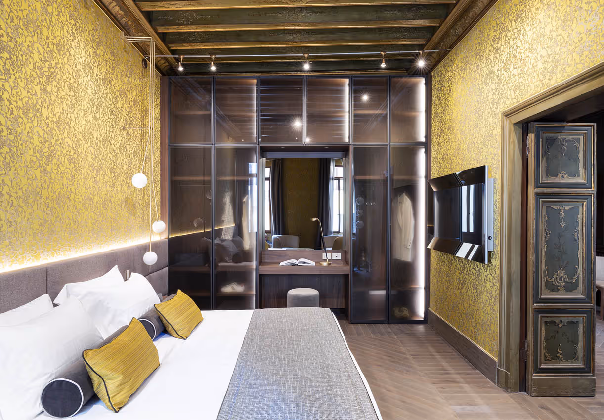 Charming room at Palazzo Pianca, a boutique hotel in Venice offering affordable luxury stays.