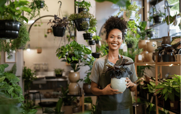 A business owner standing in a coffee shop