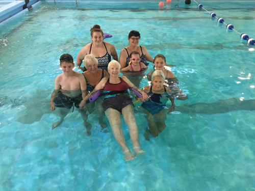 Family of all ages enjoying the pool at North County Recreation District in Nehalem Oregon
