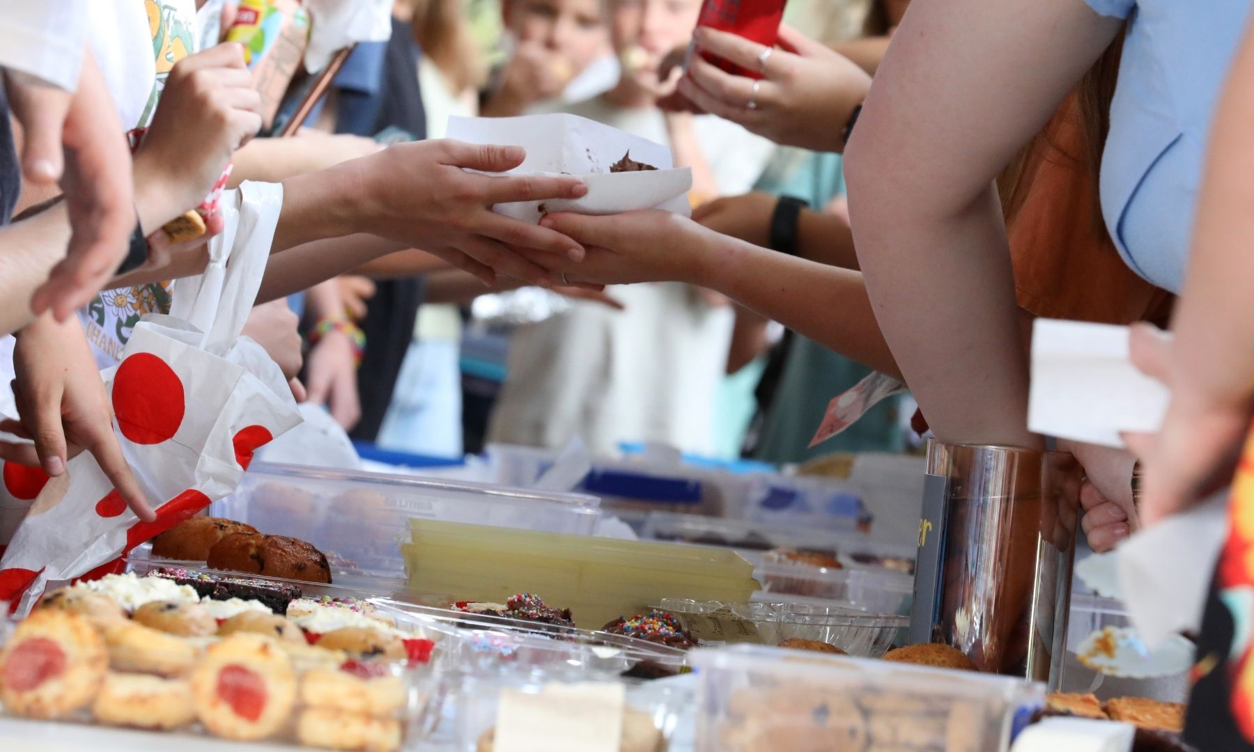 Community members participating in a neighborhood fundraiser