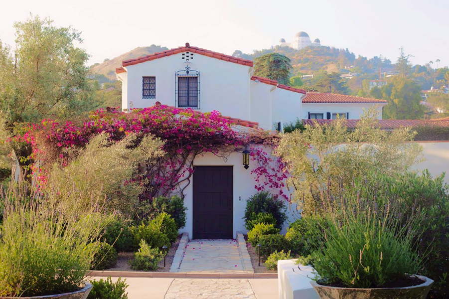 Exterior of a home with very nice landscaping.