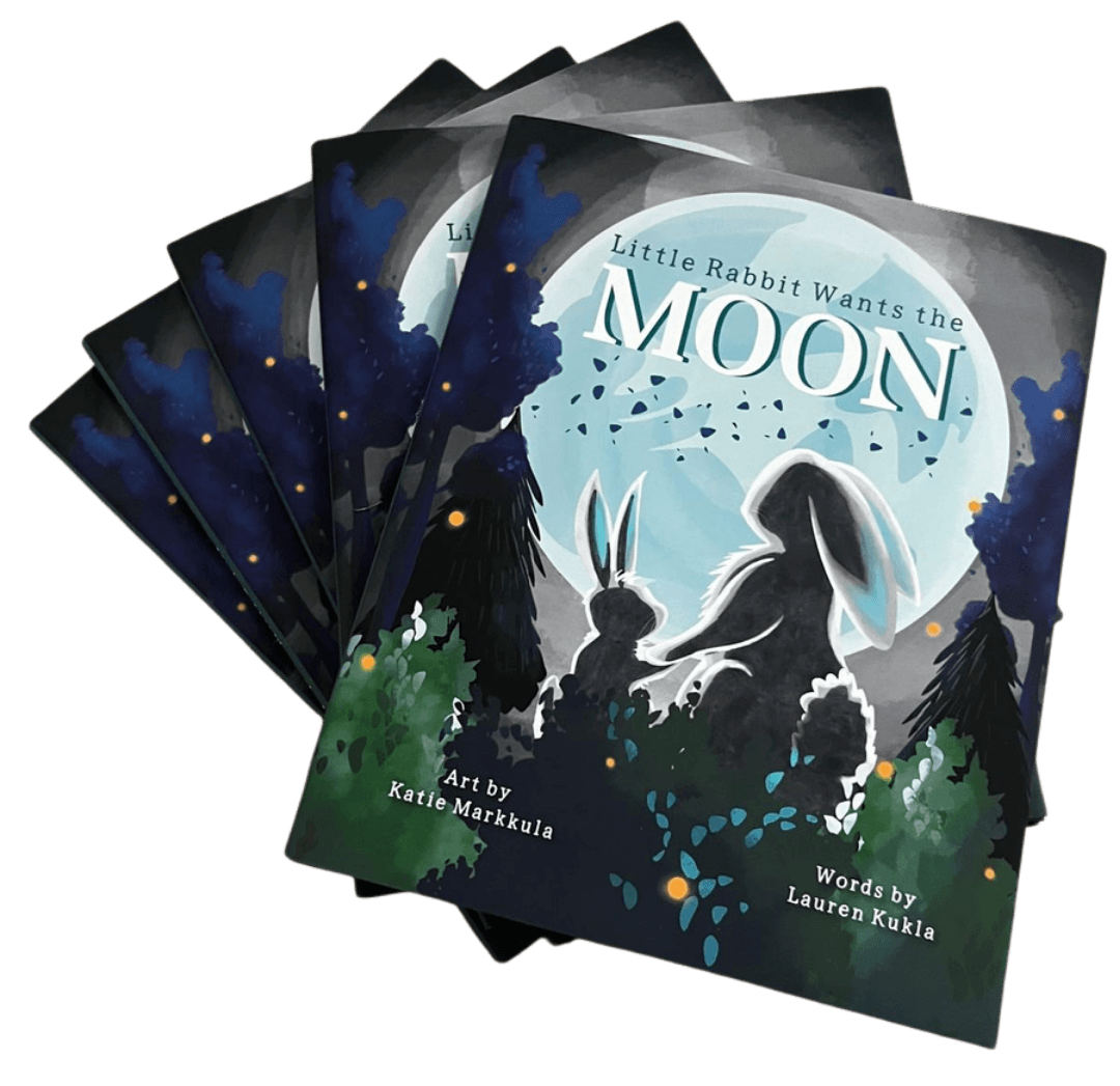 Young black mother smiles adoringly at her baby as she reads a board book.