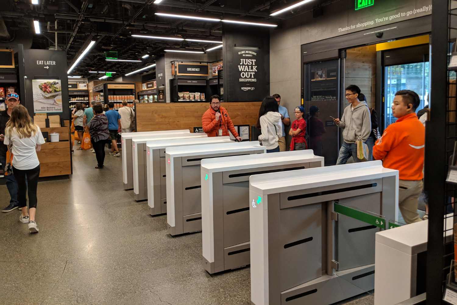 View of the front entrance inside an Amazon Go Grocery store the future of grocery and retail design